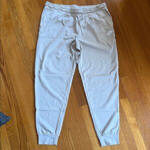 Nike Light Tan Athletic Joggers with White Swoosh